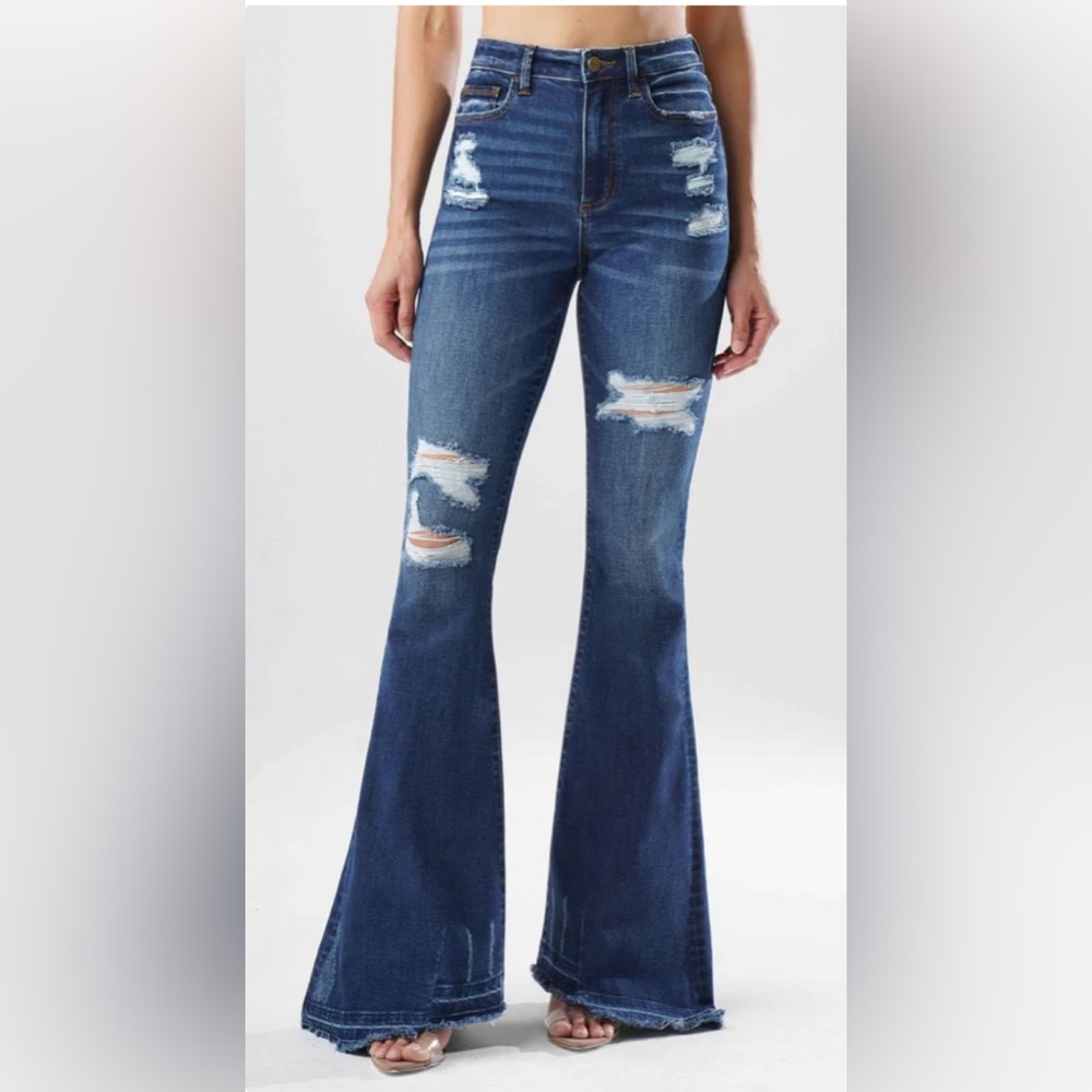 Ripped / distressed bell bottom jeans